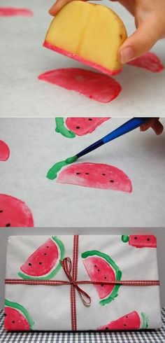 someone is painting watermelon on a piece of paper and then wrapping it up