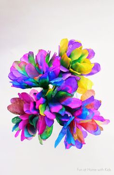 multicolored flowers on white background with text overlay that reads fun at home with kids