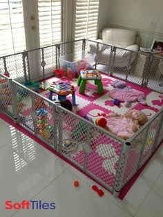 a baby crib with lots of toys in it