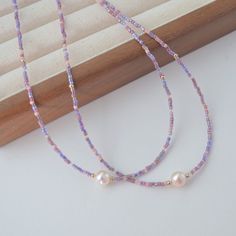 This lovely single strand beaded choker/necklace is great for adding a pop of colour. They are thin and dainty, made using 2mm seed beads and beautiful smooth freshwater pearls with great lustre. ♥ Material: Metal- Made from high quality 14K gold filled which is tarnish-resistant, waterproof, safe for sensitive skin, and can guarantee long lasting wear. Gemstone- 8mm oval pearl with great lustre Bead-Great quality Toho seed beads ♥ Size:  Necklace length 36cm with 5mm extension chain. Pop, Beaded Choker Necklace, Jewelry Necklaces, Beaded Choker