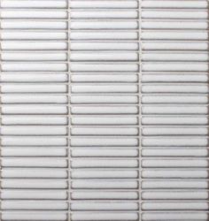 a white tile wall with several rows of tiles on it