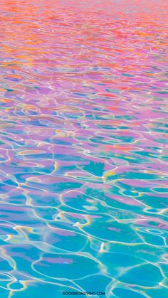 an image of water that looks like it has been painted with different colors and shapes