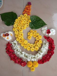 flowers arranged in the shape of a smiley face