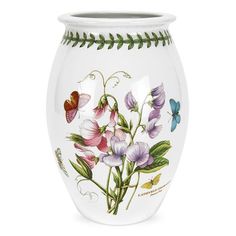 a white vase with flowers and butterflies painted on it