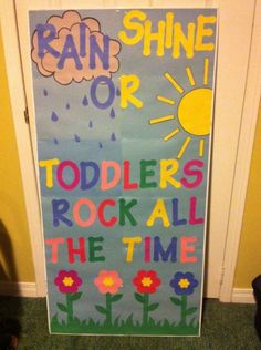 a bulletin board with the words rain or toddlers rock all the time on it