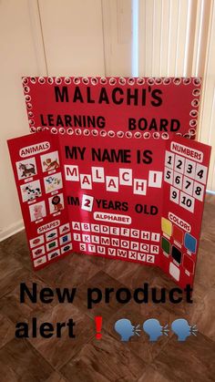 a red board with numbers and words on it