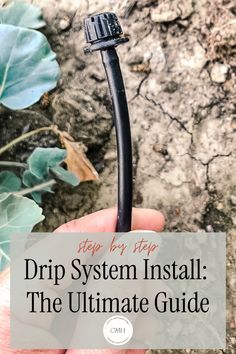 a hand holding an electric wire with the words, drip system install the ultimate guide
