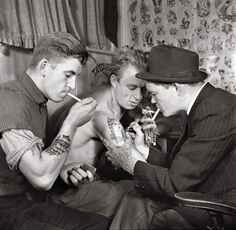 Men in a Tattoo Parlor, circa 1920s #tattooforaweek #historyart #historytattoos