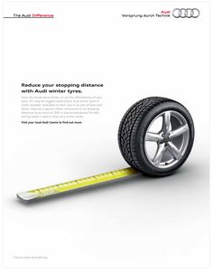 an ad for audi showing the tire on a measuring tape, with text that reads reduce your stopping distance with audi winter tires