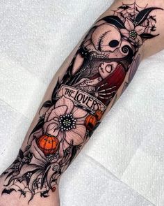 a person with a tattoo on their arm that reads be loved and decorated with pumpkins