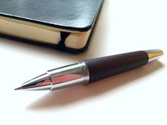 The Faber-Castell E-Motion rollerball pen in Dark Brown pear wood. Click through for a full review. #pens #fabercastell #penaddict #writing Fabercastell, Fountain Pen