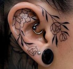 an ear with flowers painted on it