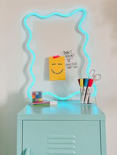 Our new neon dry erase frame keeps you organized where you can jot down your to do’s, doodles and messages. A fun addition to keep you organized in any space. Dimensions: 18"W x24"H Color: Ice Blue Ships in 7-10 days Made in USA Included with your sign: Mounted onto clear acrylic Remote with the ability to dim from 10% to 100% & flash Transparent cord 12 V UL listed power adapter Pre-drilled holes for wall mounting Inspiration, Decoration, Art, Teen Room Décor, Interior, Doodles, Neon Sign Bedroom, Teen Room Decor, Cool Room Decor