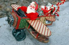 a santa clause sleigh with gifts in it