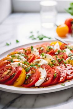 vibrant and refreshing Tomato Salad with Mozzarella! This dish is a harmonious blend of ripe, juicy tomatoes and creamy mozzarella cheese, perfectly seasoned with fresh basil leaves, extra virgin olive oil, and a dash of salt and black pepper. It's an ideal choice for a light lunch or a side dish. #TomatoSalad #Mozzarella #summersalad Christmas, Healthy Recipes, Foods, Unusual, Gratin, Awesome, Buffet, Recetas, Food