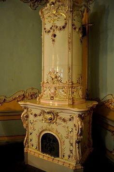 an ornate clock in the corner of a room