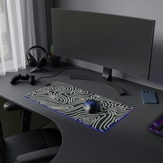 a computer desk with a mouse and keyboard on it