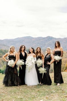 From the girls' silky getting ready pajamas to their gorgeous mix and match bridesmaid dresses, the ladies looked stunning in a dark and moody palette of black. Groomsmen were dressed to the nines to match, in classic tuxedos. #bridesmaidresses #weddingcolors #weddingtheme Bride, Looking Stunning, Bridal, Looking For Women