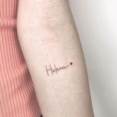 a woman's arm with the word hope written in cursive writing on it