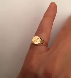 "Pinky ring, Engraved ring, Initial Ring, Personalized Ring Engraved Signet ring with Round Seal- Best quality 18k Gold Plate Engraved 1 letter - Vintage style Diameter: 0.7 mm = 0.27\" Please note in the \"notes to seller\" at checkout. : * state your ring size * letter you want to apper The product will arrive to you packed in gift box and padded envelope to maintain the product Our jewelry are water resistant and comes with 1 year warranty For more rings from us: https://www.etsy.com/il-en/sh Rings, Engraved Rings Personalized, Ring Gift, Engraved Rings, Personalized Rings