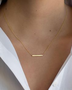 14K solid gold Bar necklace with a tiny diamond , comes in the gold color of your choice, and length of your choice, dainty and absolutely amazing! The perfect everyday necklace, by itself or layered.made in L.A.Length:16'' (if you d like 18'' simply request it in the comment box at checkout )Size: Approx. 1"Diamond: 0.01 ct wt Natural and conflict freeShips in 5 to 7 business daysComes gift ready in our beautiful branded jewelry box. Instagram, Bijoux, Diamond Bar Necklace, Gold Bar Necklace, Diamond Necklace Simple, 14k Gold Necklace, Diamond Bar, Gold Jewelry Simple Necklace, Real Gold Necklace