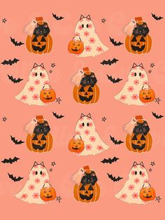 a bunch of pumpkins with cats on them and bats in the sky behind them