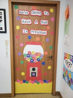 a classroom door decorated with gummy bears and we're going to have a ball in preschool