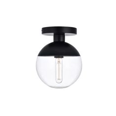 a black and white light fixture with a glass globe