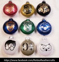 twelve harry potter christmas ornament ornaments in different colors and designs on white background
