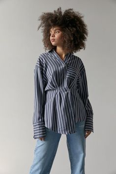 Menswear-inspired shirt from UO with a button front and wrap-style peplum hem. UO exclusive. Ideas, Peplum, Menswear, Crafts, Button Up Shirts, Short Sleeve Button Up