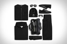 an assortment of men's clothing and accessories laid out