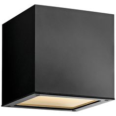 a black square light fixture on a white background