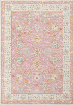 a pink and yellow rug with an ornate design