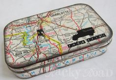 a small tin with a map on it