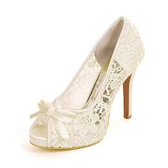 a white high heeled shoe with a bow on the toe and lace overlays