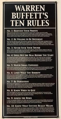 a sign on the side of a building that says, warren buffetett's ten rules