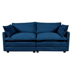 a blue couch with two pillows on it