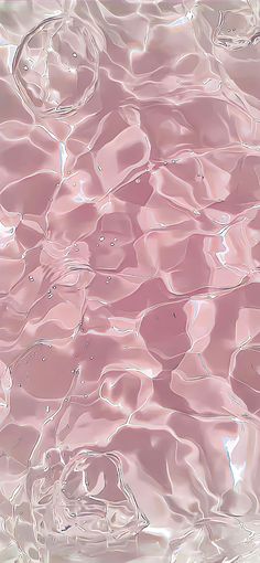 the water is pink and has ripples on it's surface, as seen from above