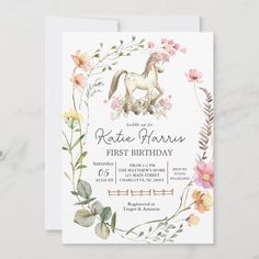 a birthday card with an image of a horse surrounded by flowers and greenery on the front