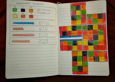 an open notebook with colored squares on it