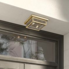 a close up of a door with a light above it