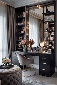 a room with a desk, mirror and stool in it's centerpieces