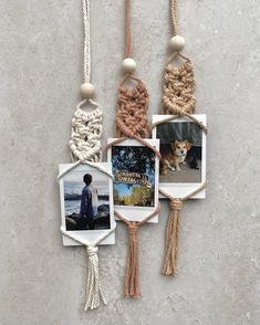 four pictures hanging on ropes with rope attached to them
