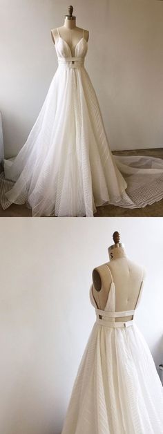 the back and side views of a wedding dress on display in front of a mannequin