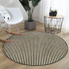 a black and white striped rug in a living room