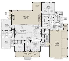 the floor plan for a home with two master suites and an open concept living area