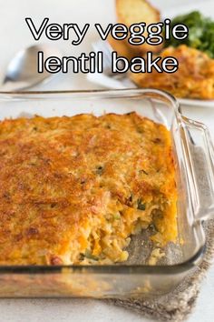 a casserole dish with vegetables in it and the words very veggie lentil bake