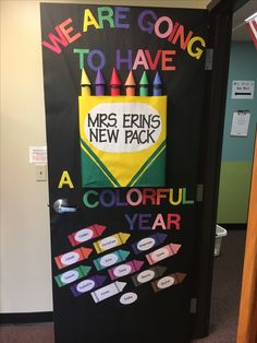 a door decorated with colorful crayons and the words we are going to have