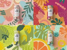 three cans of red wine on a colorful floral wallpaper with oranges and leaves