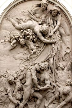 an intricately carved relief depicting the birth of venus